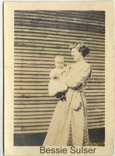Bessie Sulser holding unknown baby