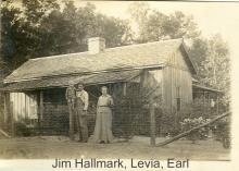 Jim and Olivia Prince Hallmark, son Earl, in front of their house